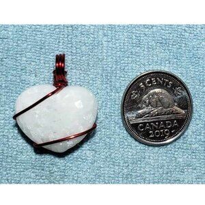 Hand Carved Milky Quarts Pendant